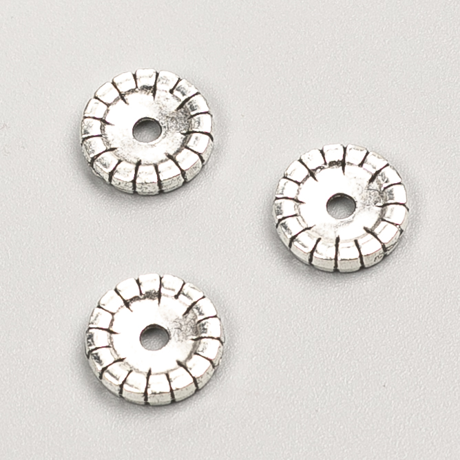 Korálka-vložka, průměr 10×2 mm, balení 20 g, 27 ks ±, barva kovu 'stříbro'