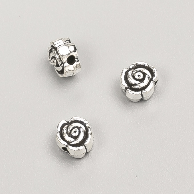 Bižuterní součástka – korálka-vložka Květka, průměr 7×4 mm, balení 20 g, cca 39 ks, barva kovu 'stříbro'
