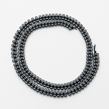 Korálky z hematitu 'Květka', průměr 6×3 mm, délka cca 40 cm na niti