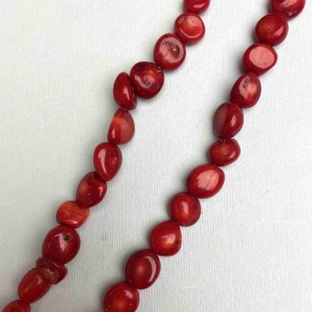 Přírodní korál oválný na niti, průměr 11-13×11-12 mm, délka 40 cm