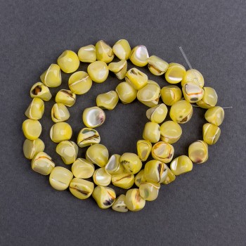 Korálky tónované perleťové žluté, brusované, průměr 8×6 mm, délka cca 41 cm na niti
