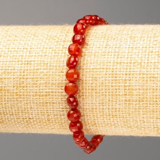 Náramek z karneolu, přírodního kamene, facettovaná mince, průměr 6×5 mm, délka 18 cm (elastický)