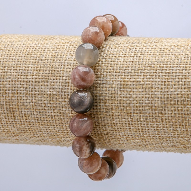 Náramek ze selenitu na gumičce, hladké kuličky, průměr 10 mm, obvod 18 cm