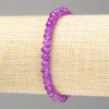 Náramek z tónovaného syntetického kamene ametyst světlé fialové barvy, brusované rondely, průměr 6×4 mm, délka 18 cm (elastický)
