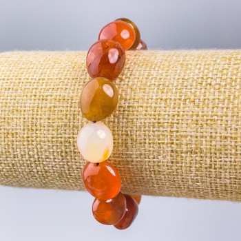 Náramek karneol, přírodní kámen, fazetovaný, průměr 14×12 mm, délka 18 cm (elastický)