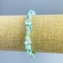 Náramek z perleti světle modré barvy, brusované korálky 8×6 mm, délka 18 cm (elastický)