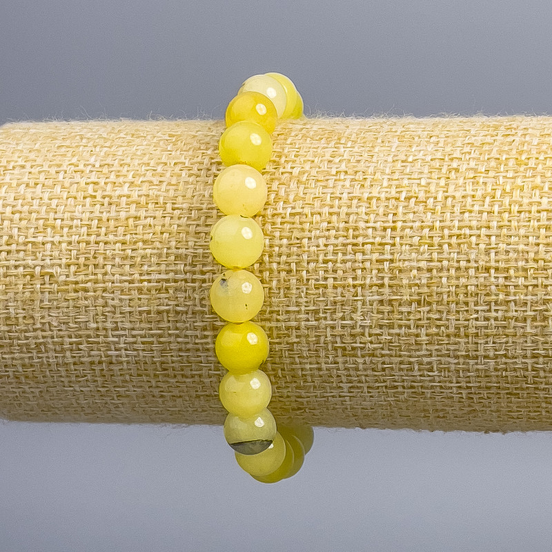 Náramek z tonovaného křemene Vlásený – hladká kulička, průměr cca 8 mm, délka 18 cm (na pružném základu)