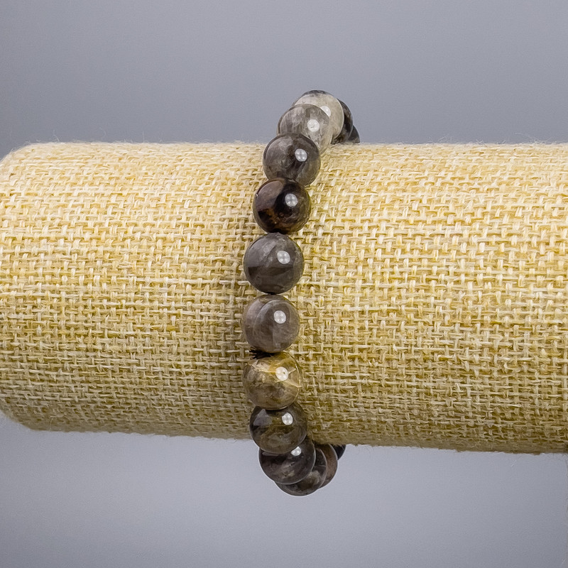 Náramek ze slunečního kamene, hladká kulička, průměr cca 10 mm, délka 18 cm, elastický