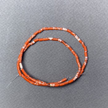 Korálky z variscitu oranžové (fasetované), průměr 2×4 mm, délka 38 cm ±, na niti