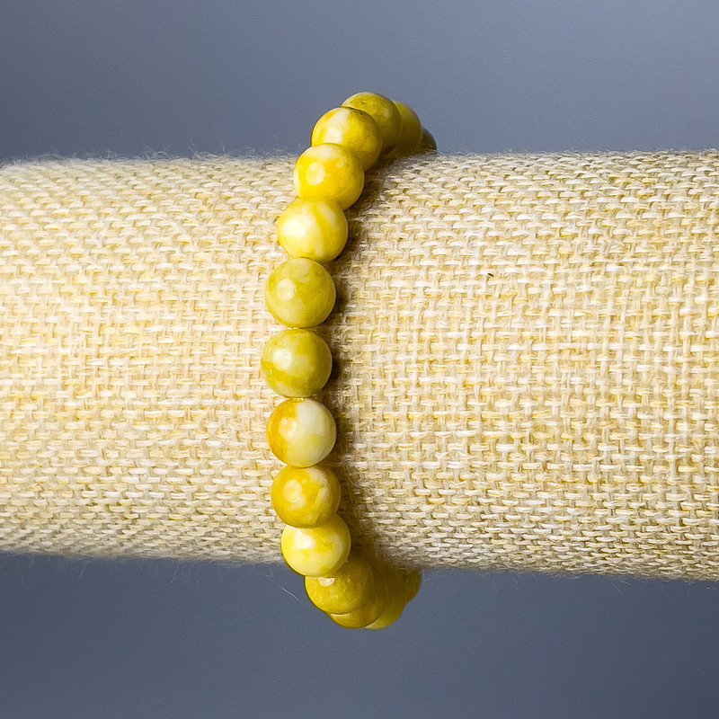 Náramek z žlutého jadeitu – hladké kuličky, průměr cca 8,5 mm, délka 18 cm (na gumičce)
