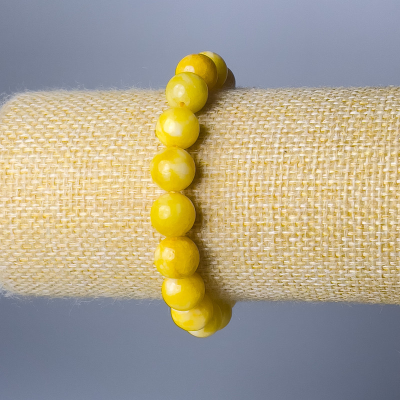 Náramek ze žlutého jadeitu — hladké kuličky o průměru 10 mm, délka 18 cm (elastický)