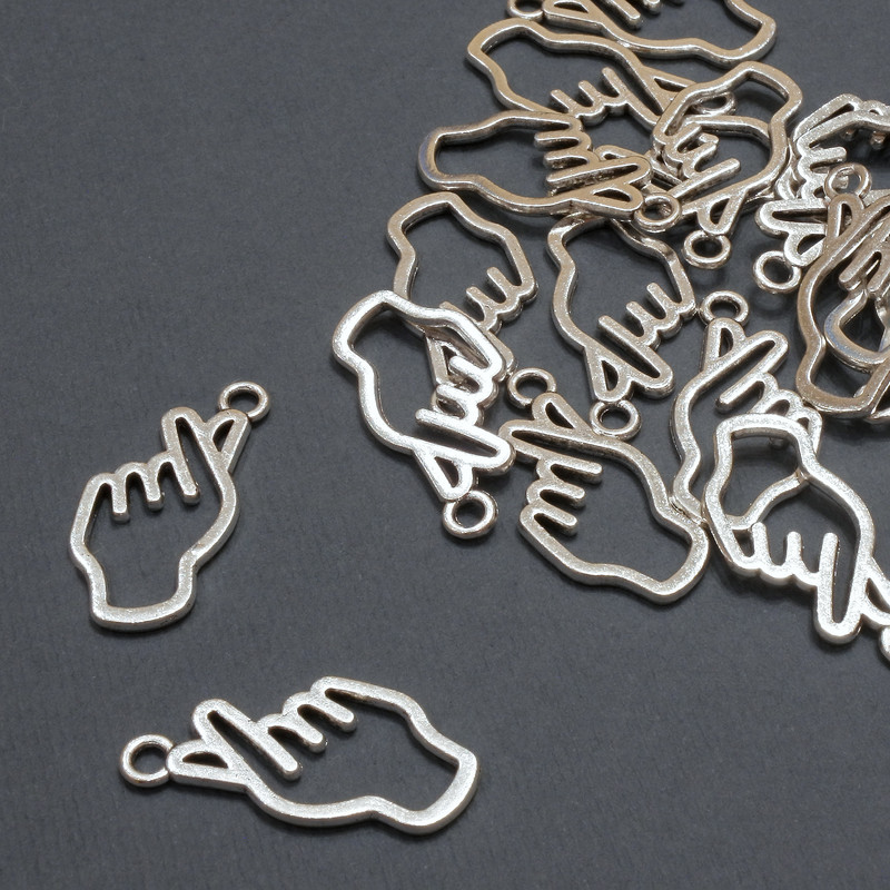 Přívěšek 'Ruka', průměr 12×24 mm, balení 20 g, 21 ks (+ -)