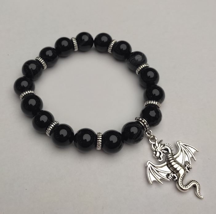 Náramek z černého achátu – hladké kuličky, průměr 10 mm ±, délka 18 cm ± (elastický) s kovovými vložkami