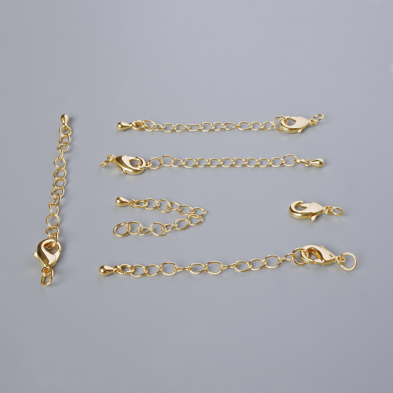 Karabinkové zapínání s prodlužovacím řetízkem, průměr 12×6 mm, délka 5,5 cm, zlatý odstín kovu, 1 ks