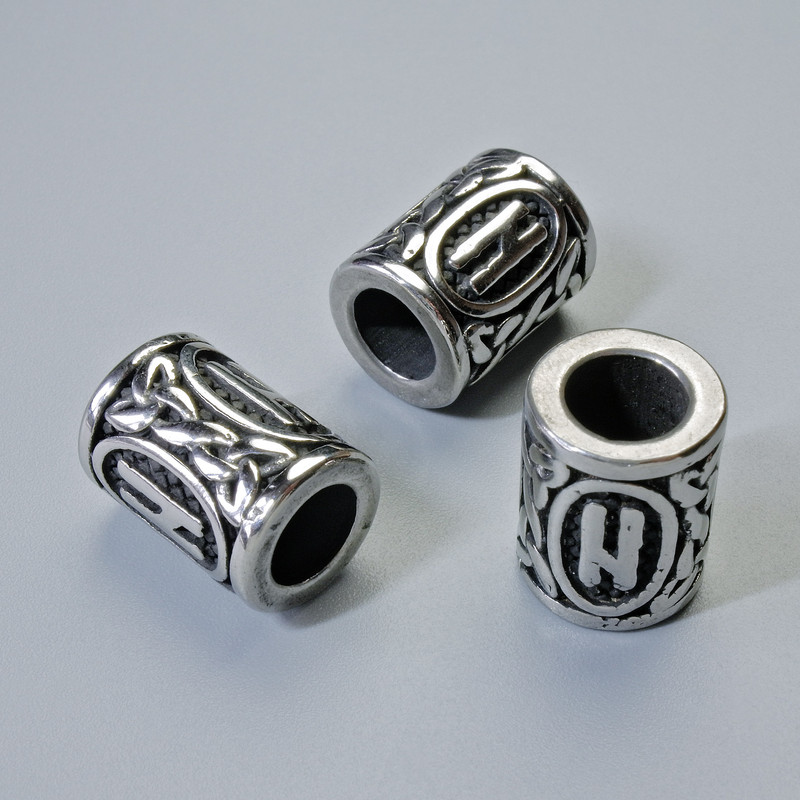 Korálek se skandinávskou runou, rozměr 13×10 mm (+/-), otvor 6 mm, stříbrná barva kovu, 1 ks