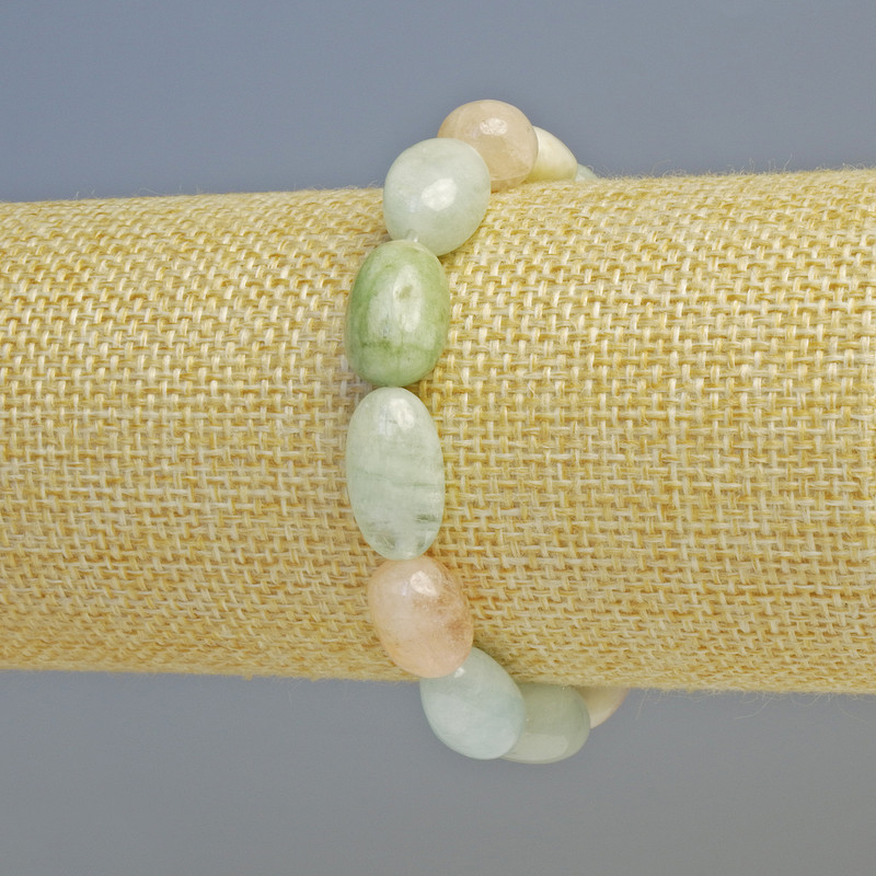 Náramek z morganitu, brusiované korálky, průměr 10×13 mm ± (elastické), délka 18 cm+