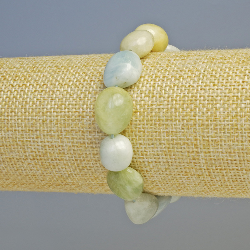 Náramek z morganitu, fazetované korálky, průměr 12×14 mm, elastický, délka 18 cm