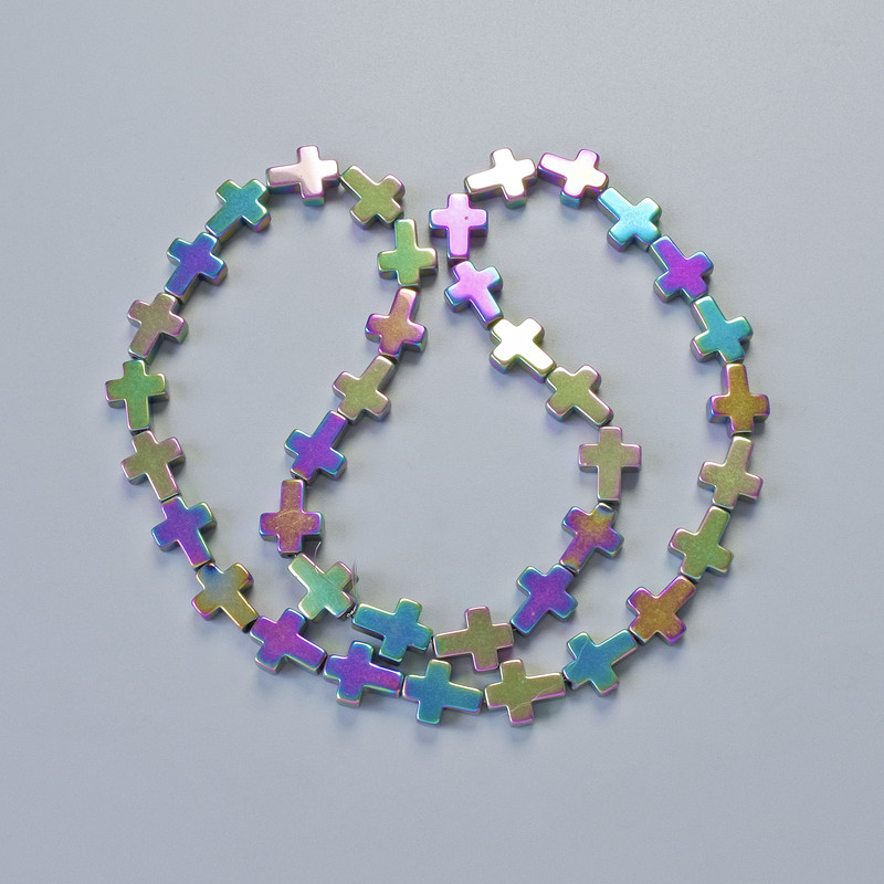 Hematitové korálky ve tvaru kříže, barva chameleon, rozměry 8,5×10,5×3 mm, délka 40 cm ± na niti