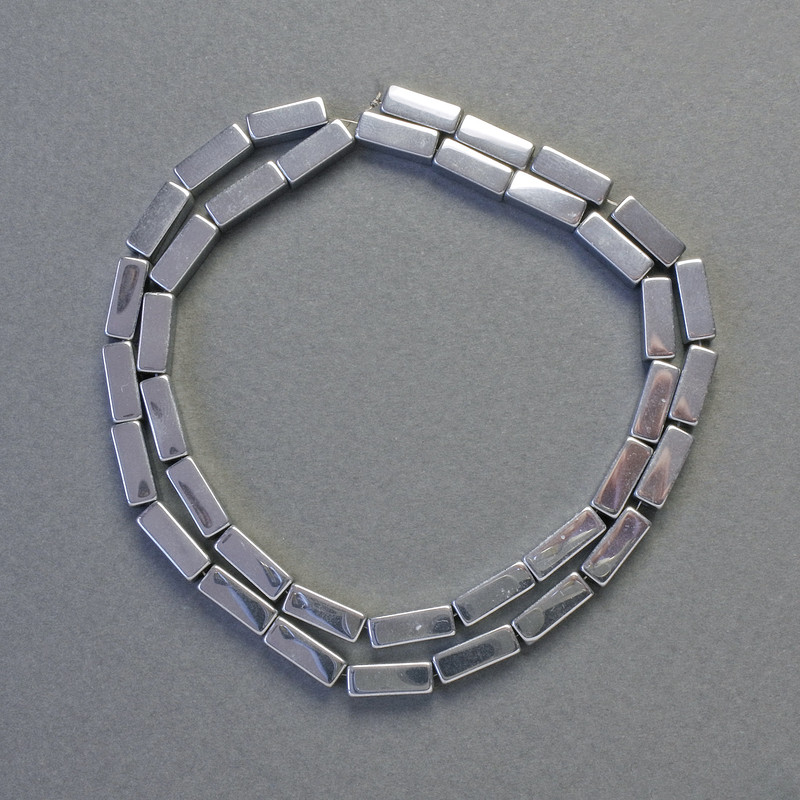 Hematitové korálky obdélníkového tvaru, barva stříbrná, rozměr 10×4 mm
