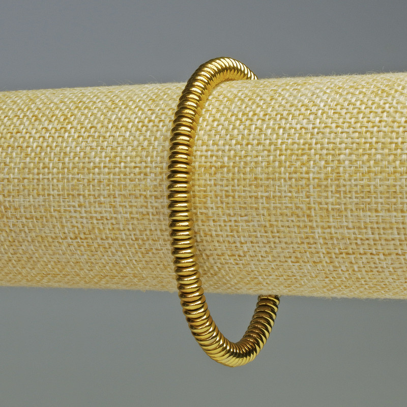 Náramek z hematitu, rondely, barva tmavě zlata, průměr 6×2 mm, délka cca 18 cm, na pružné gumičce