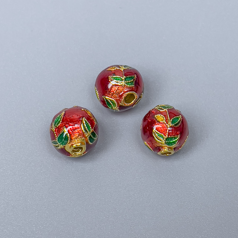 Korálka Cloisonné červená a zelená, emailem zdobená, průměr 9 mm, otvor 2 mm, zlatistá barva kovu, 1 ks