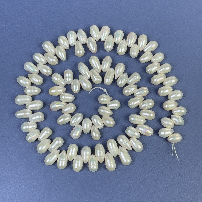 Oválné říční perly «motýlek» 9×6 mm + na vlasové niti, délka 41 cm+