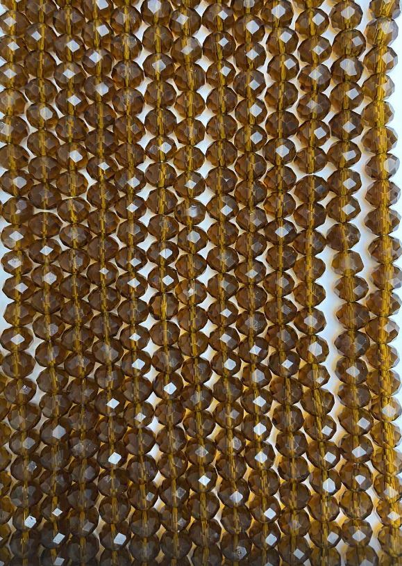 Korálky z českého křišťálu na vlasci, hnědo-průhledné broušené rondely, průměr 8×6 mm, délka 40 cm +
