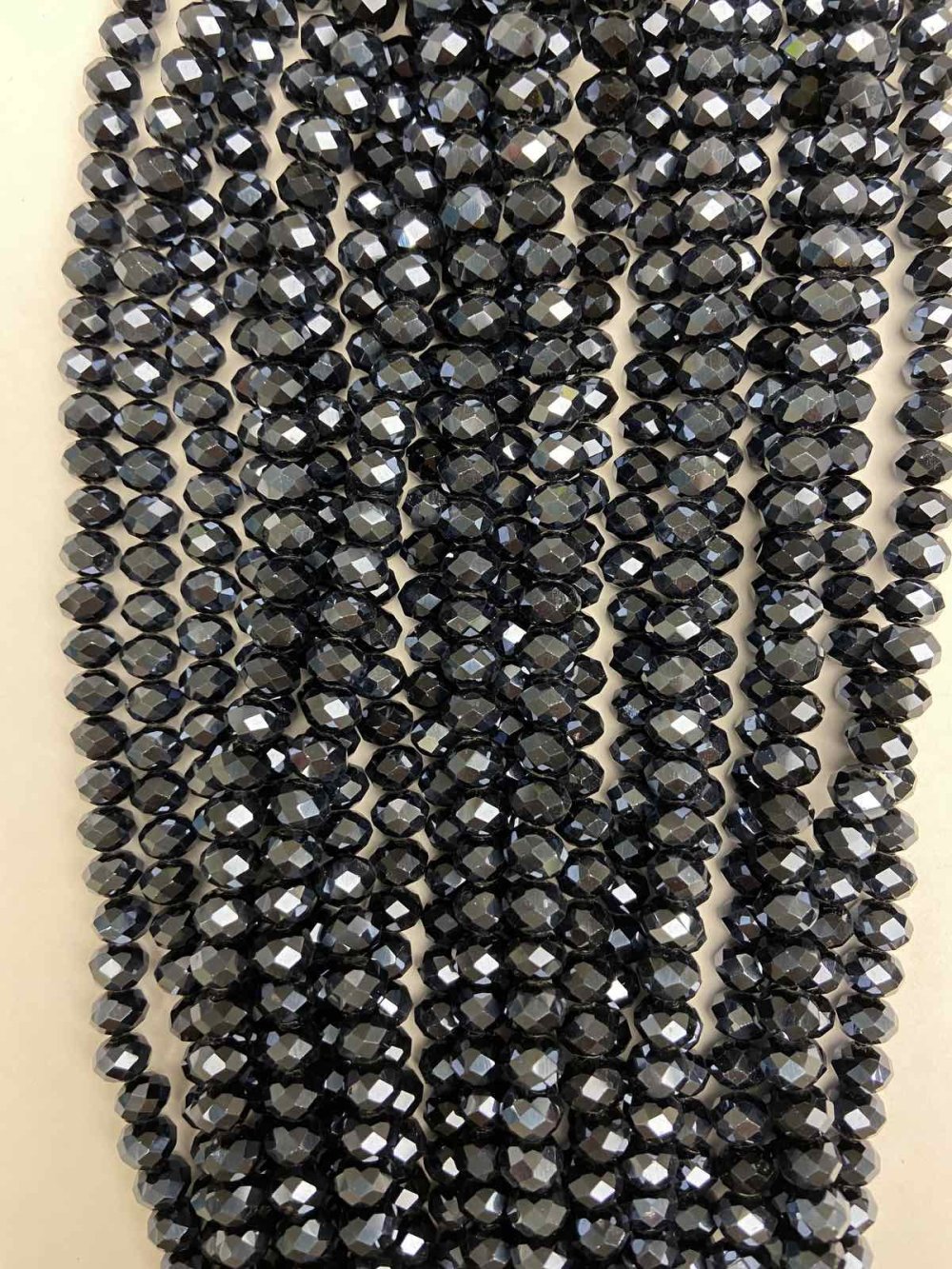 Korálky z českého křišťálu na niti, černé matné, brusovaný rondel, průměr 8×6 mm, délka 40 cm