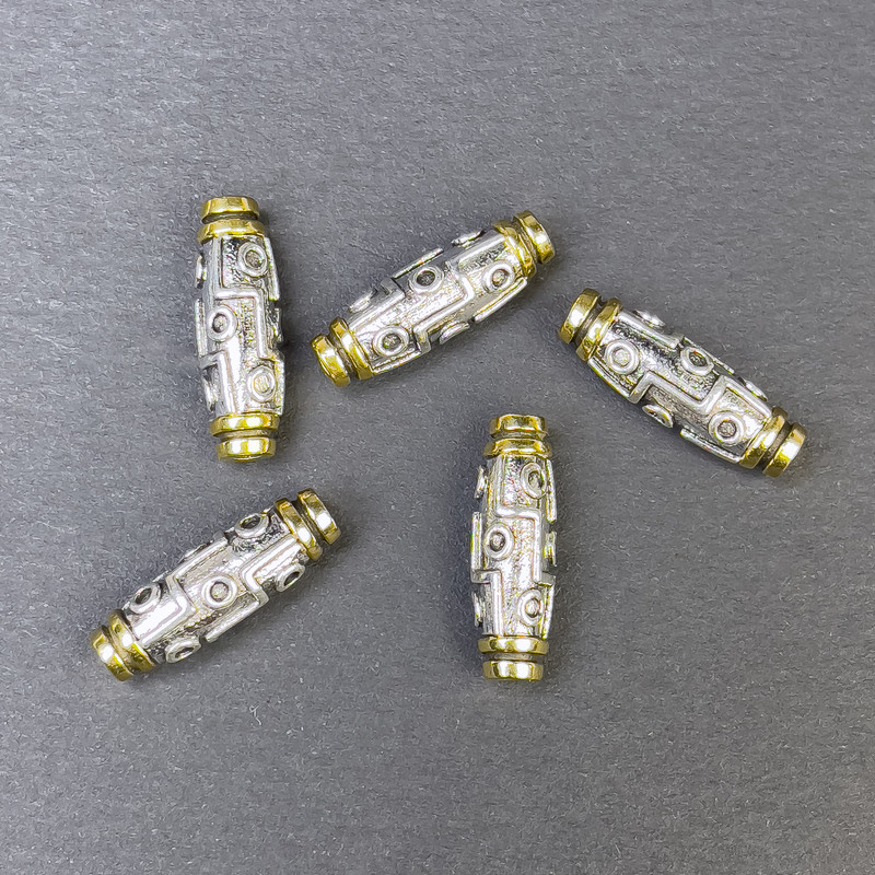 Korálka–vloženka kovová ve stříbrno-zlaté barvě, průměr 19,5×6 mm ±, otvor 2 mm ±, cena za 1 ks