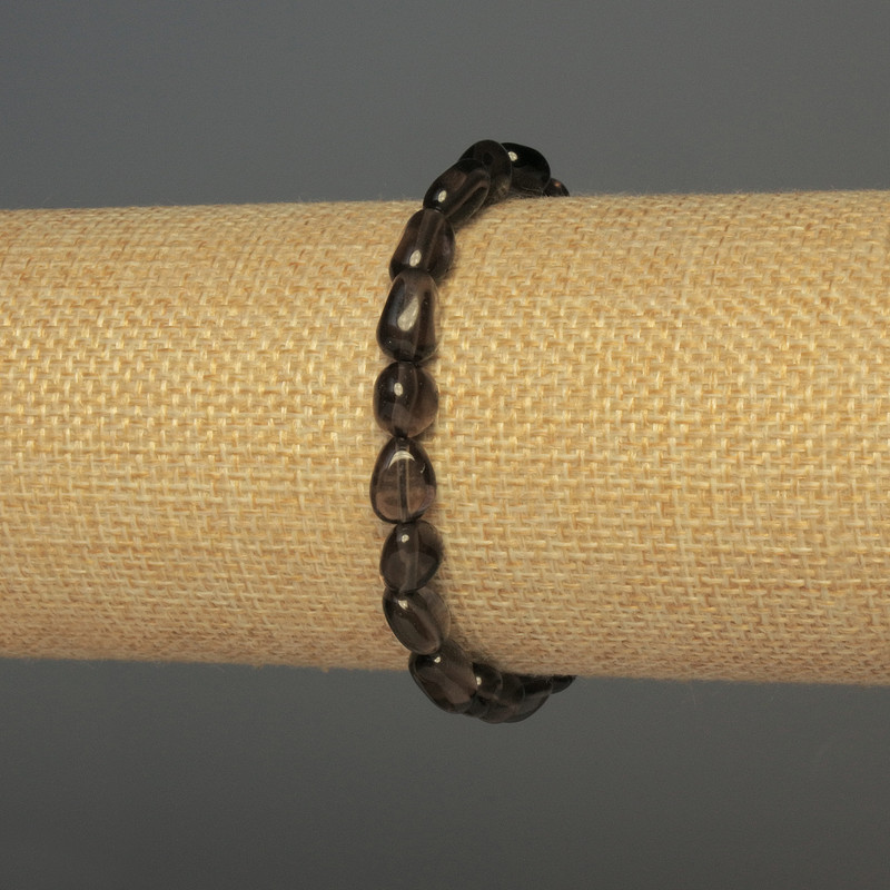 Náramek z rauhtopazu, broušené korálky, průměr 7–10×7 mm, délka 18 cm, elastický