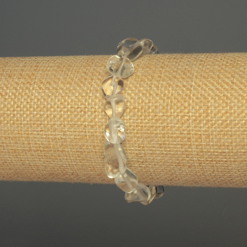 Náramek z horského křišťálu, broušené korálky, průměr 8–12×9 mm, délka 18 cm, elastický