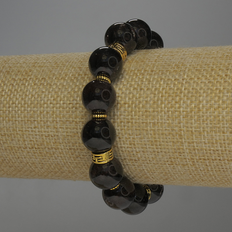 Náramek z granátu, hladké korálky, průměr 12 mm ±, s kovovými vložkami, délka 18 cm, elastické provedení