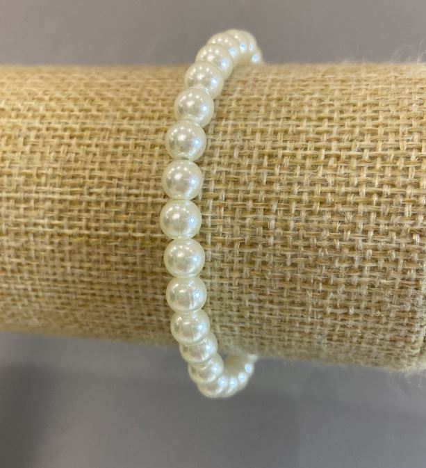 Náramek perlový (akryl) bílý, průměr 6 mm, délka 18 cm, pružný