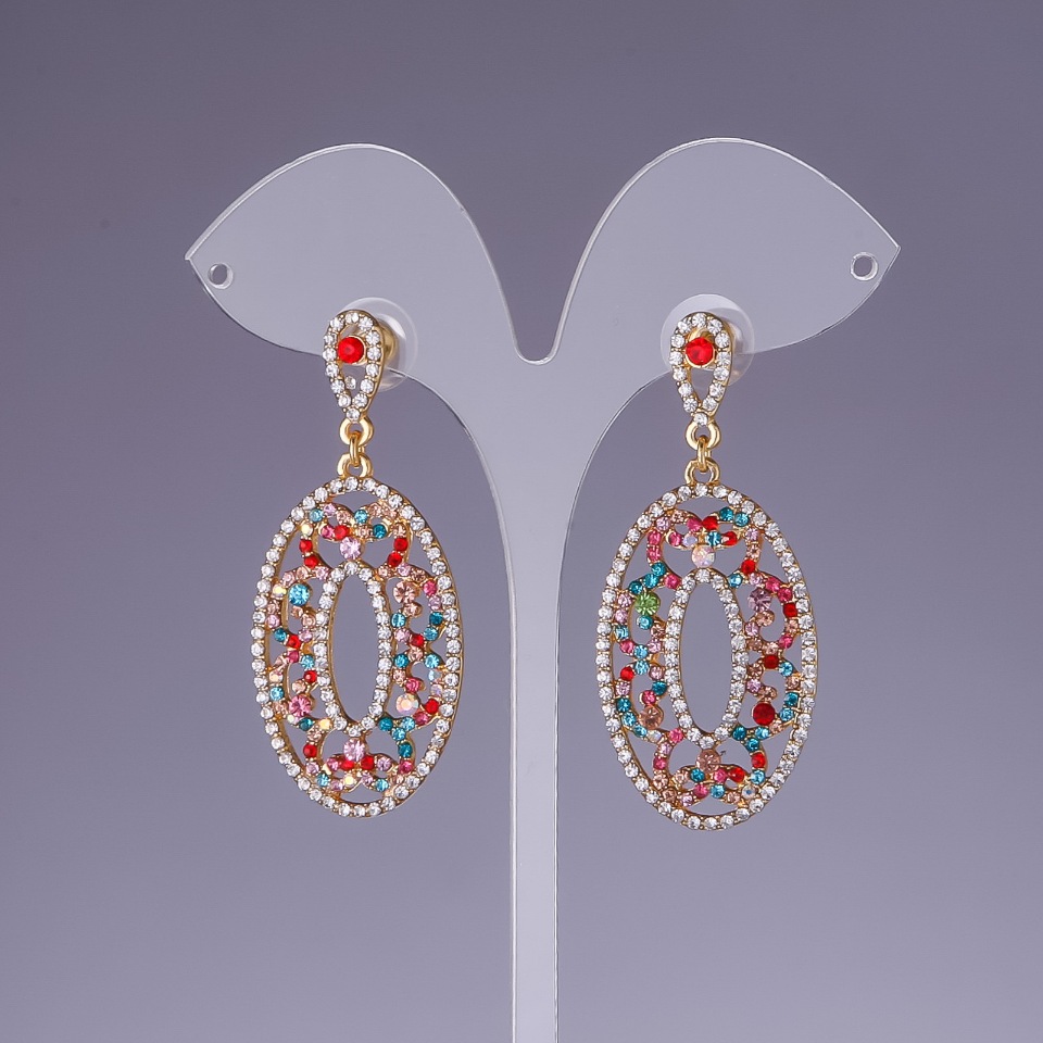 Сережки з різнокольоровими стразами, довжина 5, 5 см жовтий метал