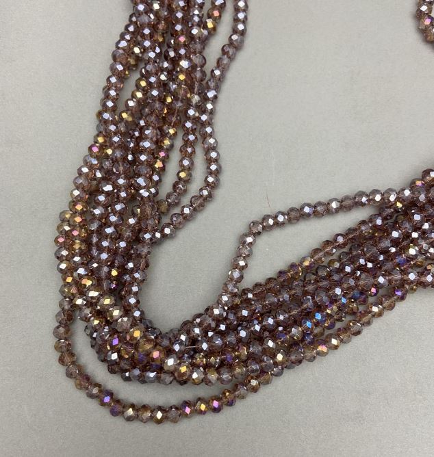 Korálky Českého křišťálu na niti, hnědo-průhledné s benzínovým nástřikem, brusovaný rondel, průměr 6×5 mm, délka 40–41 cm