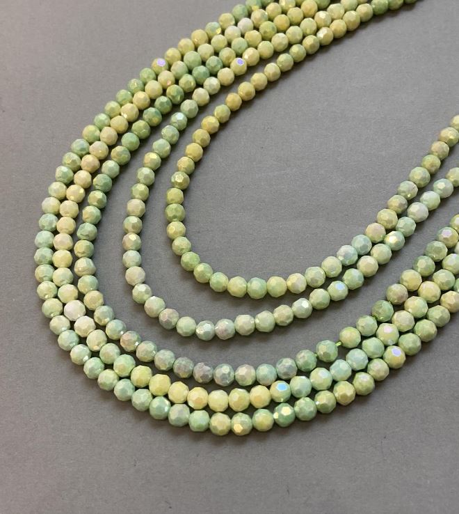 Korálky z českého křišťálu multicolor s benzínovým nástřikem na niti, brusné kuličky, průměr 6 mm, délka 38 cm