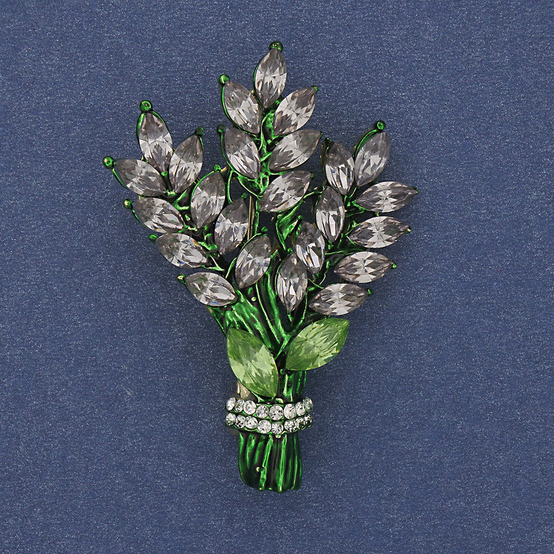 Brožka „Větvička“ zlatistého kovu se bledě fialovými a bílými štrasami 43×29 mm +