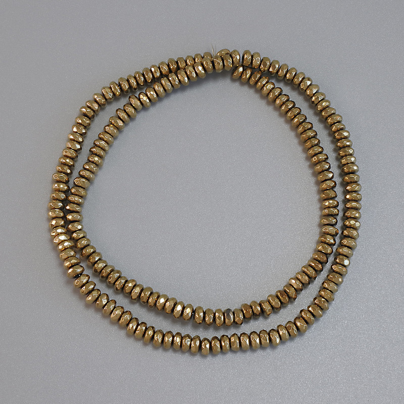 Hematitové korálky zlaté granované rondely 4×2 mm na vlascu, délka 38 cm+