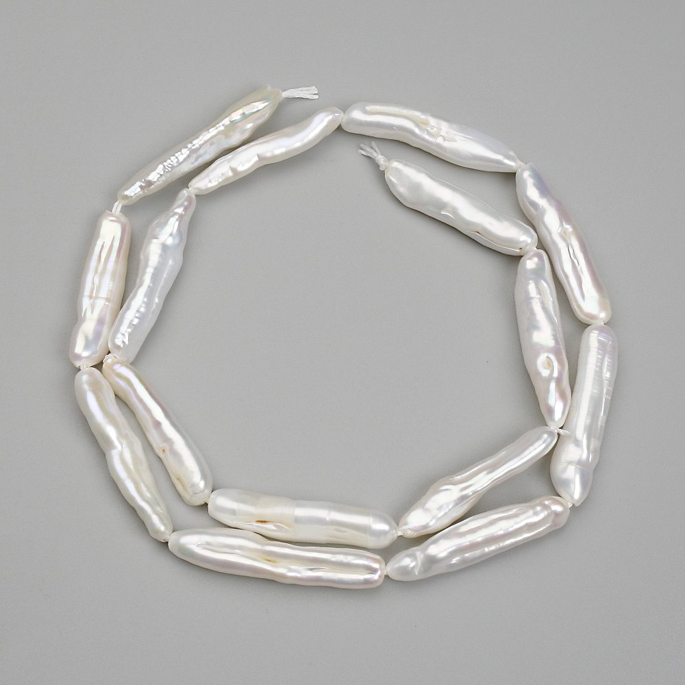 Barokní perly – korálky s odstínem „benzín“ 24-25×5-5, 5 mm +-, délka 39 cm+