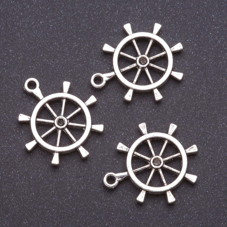 Přívěšek – kormidlo, šedý kov, rozměry: b 4 mm, L 7 mm, hmotnost 20 g, balení ±7 ks