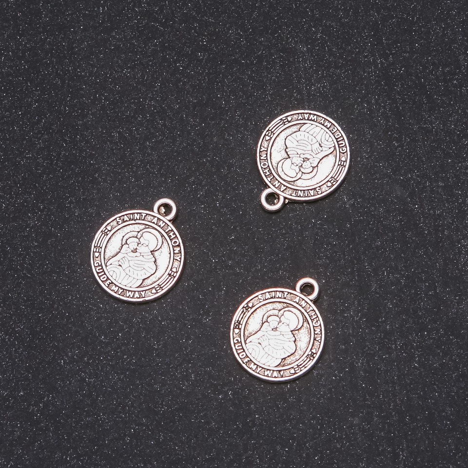 Přívěšek Svatý Antonín 15×18 mm balení 20 g ±12 ks