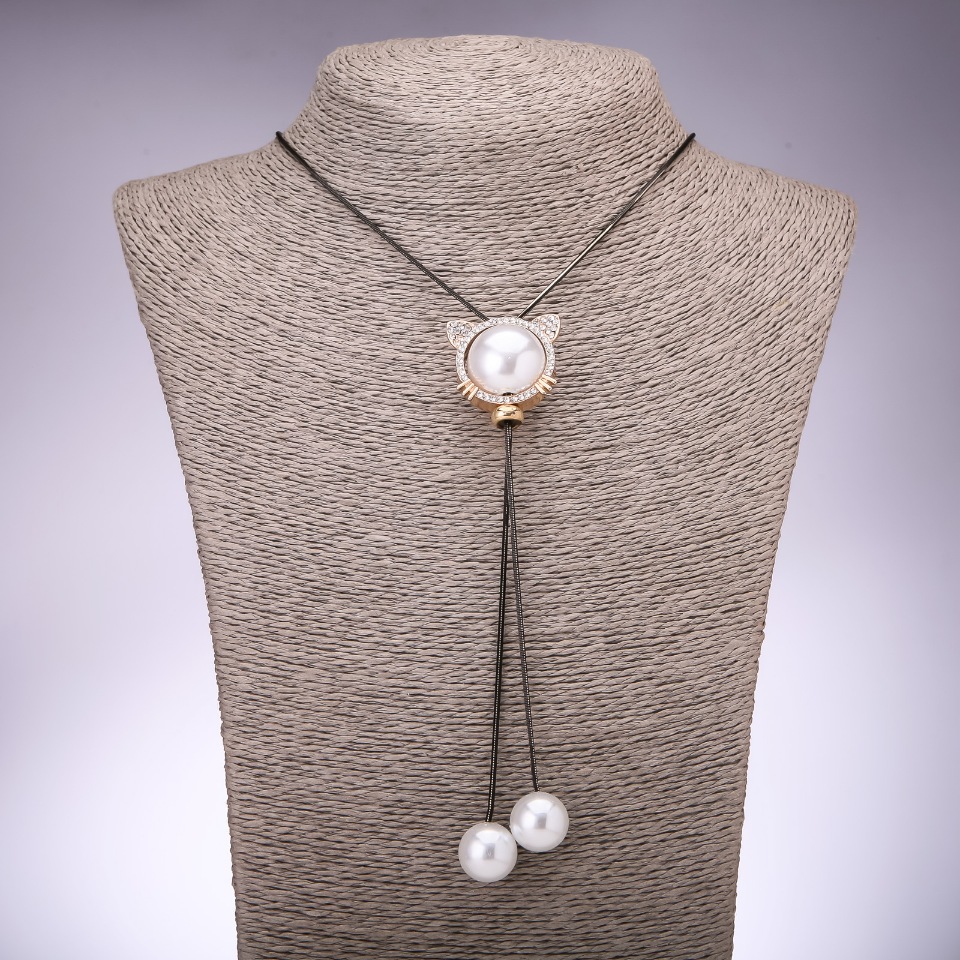 Přívěšek «Kočka» zlatavý, průměr 29×25 mm na dlouhém řetízku «černé zlato», délka 100 cm