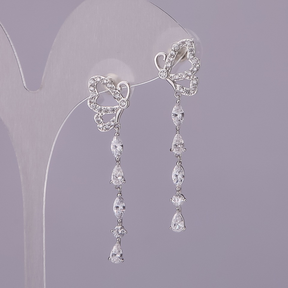 Peckové náušnice Motýlky s bílými krystaly, stříbrný kov, 11 × 40 mm