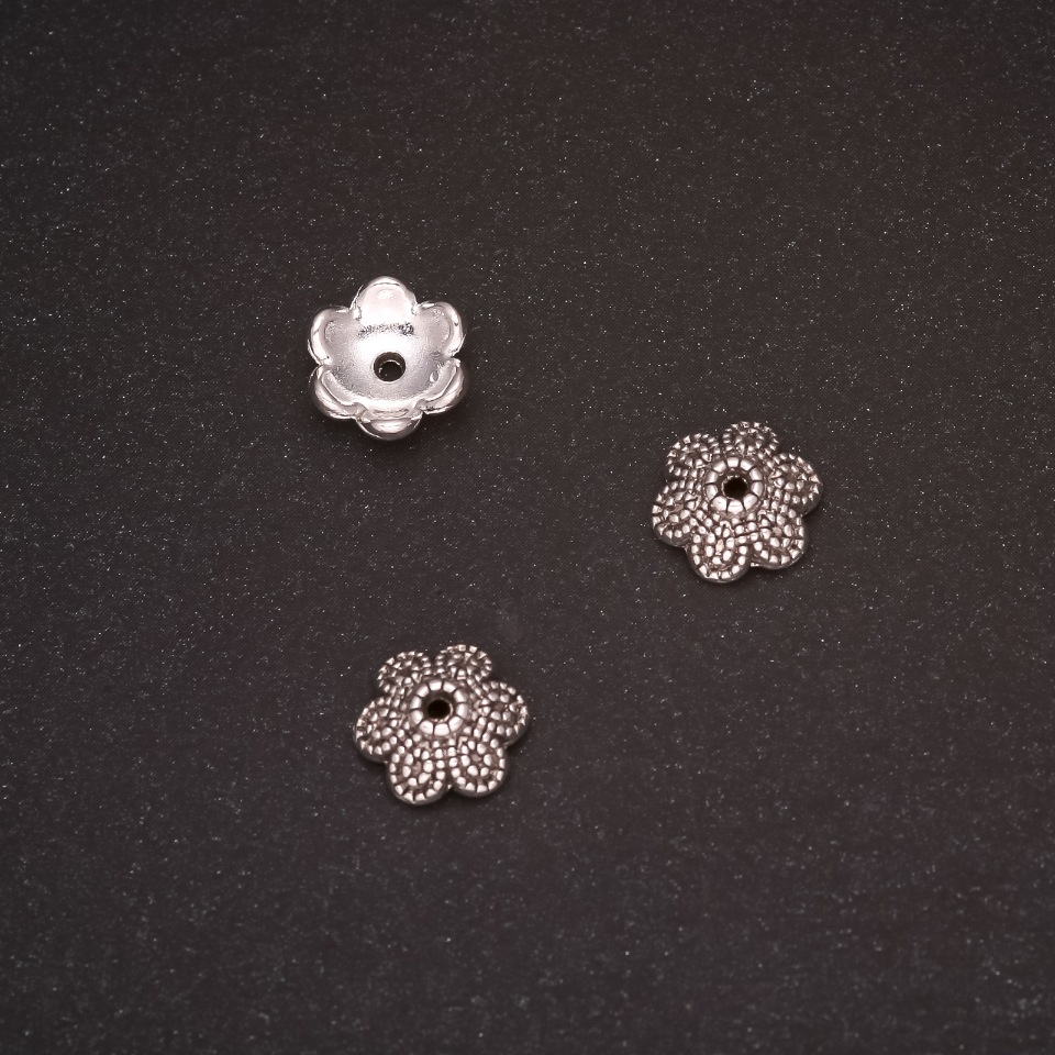 Koncovky pro bižuterii, průměr 10×4 mm, vnitřní průměr 1,5 mm, balení 20 g ± 22 ks