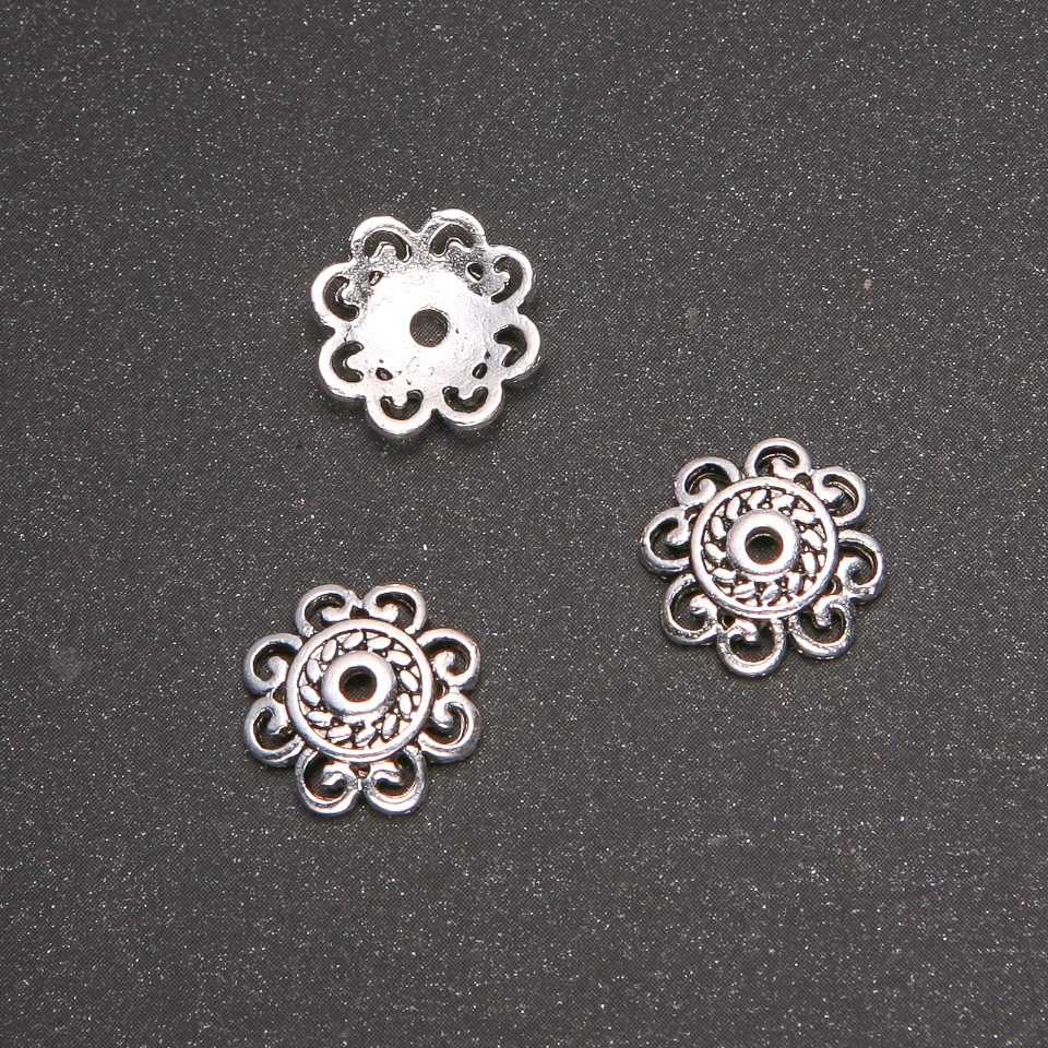 Koncovka pro šperky, průměr 13 mm, vnitřní průměr 7 mm, balení 20 g ± 17 ks