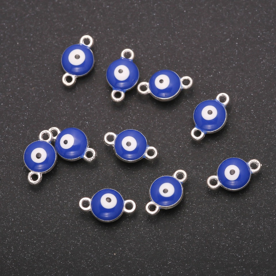 Konektor oko 7×11 mm, balení 12 ks, šedý kov