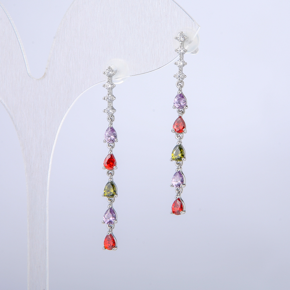 Náušnice Xuping – pecky kulaté rhodiované se bílými štrasovými kameny a krystaly, délka 42 mm