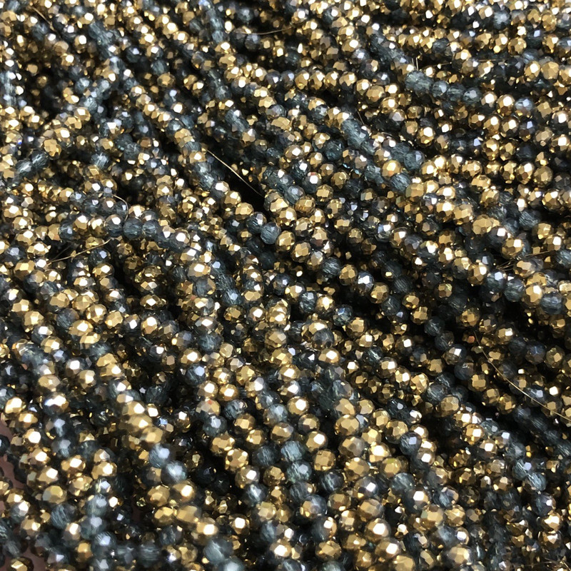 Korálky Český křišťál na vlasci – assortiment šedých, průsvitně šedých a zlatavých odstínů, brusovaný rondel, průměr 3×2,5 mm, délka 36 cm