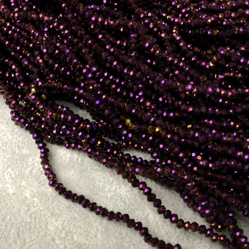 Korálky z českého křišťálu na vlasové niti v odstínu švestkového tónu s jemným benzínovým leskem, broušené rondely, průměr 3×2,5 mm, délka 36–38 cm