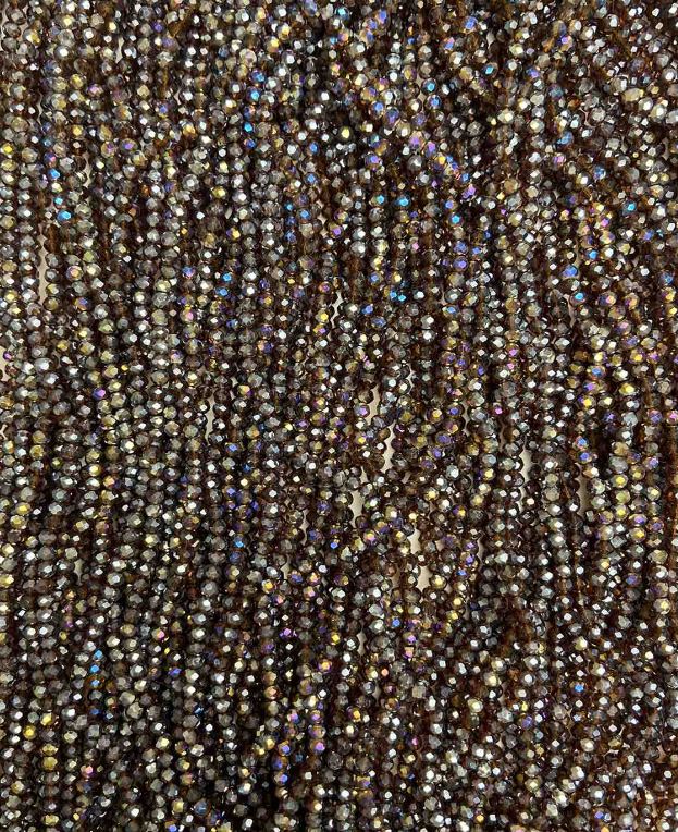 Korálky z českého křišťálu na niti, hnědé s benzínovým nástřikem, brusované rondely, průměr cca 3,5×3 mm, délka cca 32 cm